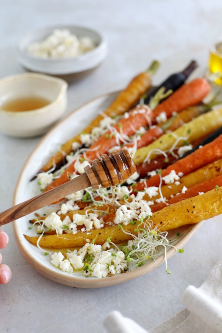 These roasted carrots with feta make a simple vegetarian side for Easter, Thanksgiving, and every occasion in between!