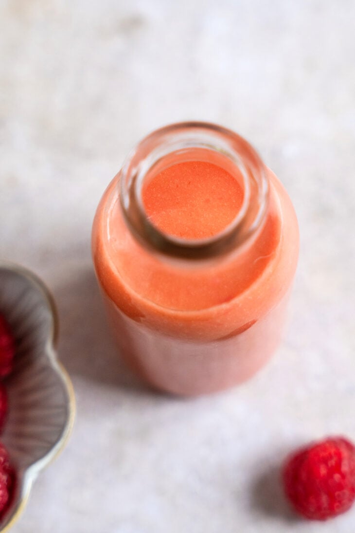 Upgrade your summer salads with this fantastic raspberry vinaigrette. Sweet and tart, with sharp flavors, this fruity dressing comes together in minutes and is absolutely fabulous!