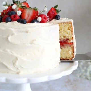 This small strawberry vanilla cake is perfect for any small celebration. It features a 6-inch two layer cake, a simple filling of strawberries and a smooth and creamy vanilla buttercream.