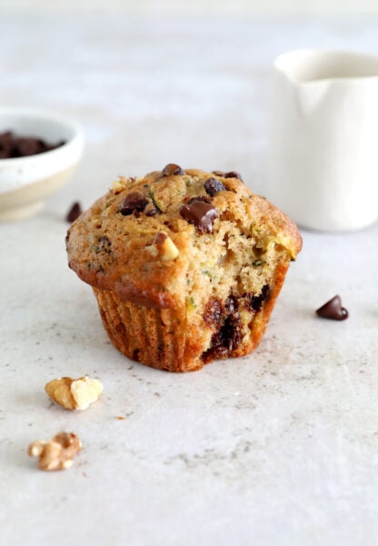 These generous chocolate chip zucchini muffins are perfection. They're tall, fluffy, extremely moist thanks to the zucchini, and packed with delicious flavors.