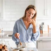 Del cooking and testing the food