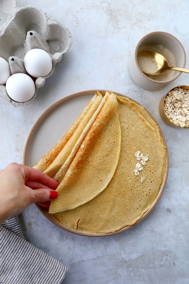 Oat crepes are prepared with oats, which makes them nutritious, fiber-rich, and easy to adapt in a gluten-free and dairy-free version.