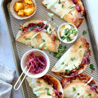 These crispy oven black bean tacos are vegetarian and packed with flavors. Ready in just 30 minutes, they are perfect to feed a crowd.