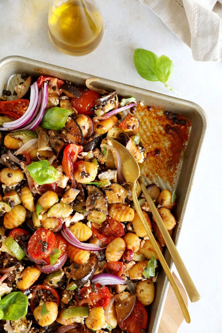 This Greek vegetarian sheet pan gnocchi with roasted summer vegetables, feta cheese and beluga lentils is loaded with flavors.