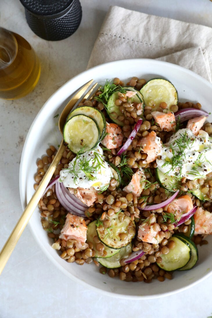 This simple warm salmon lentil salad with tzatziki makes for a great lunch or dinner, packed with nutrients and good-for-you ingredients.