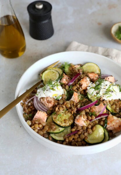 This simple warm salmon lentil salad with tzatziki makes for a great lunch or dinner, packed with nutrients and good-for-you ingredients.