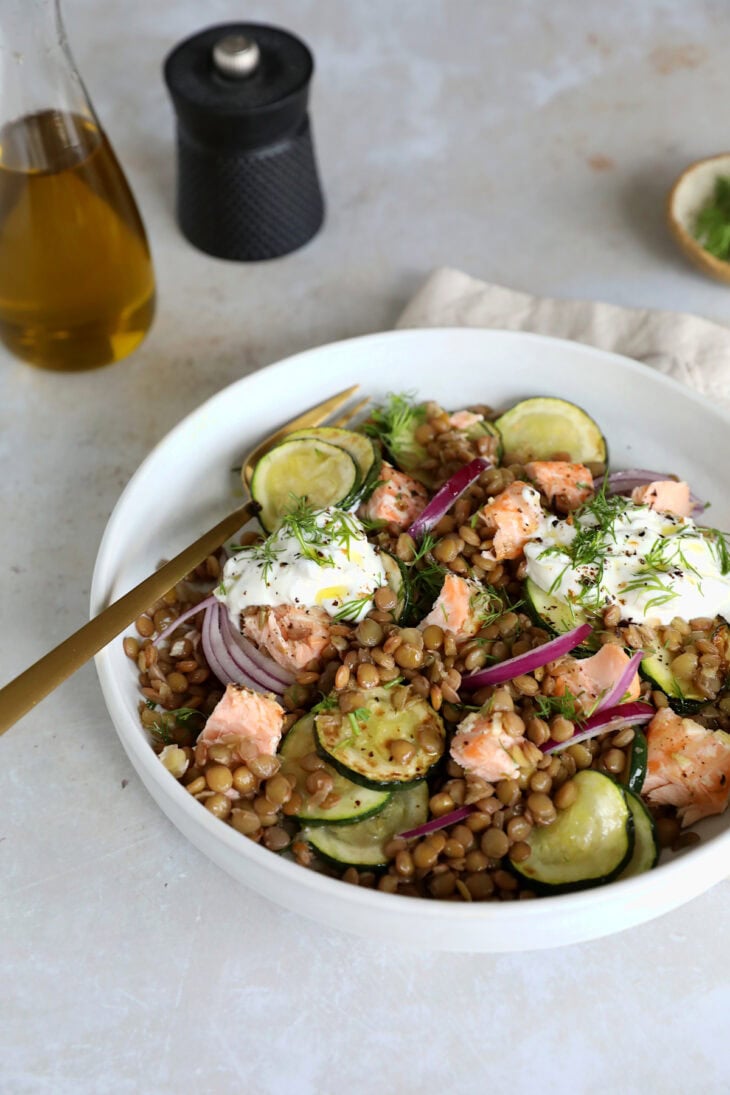 This simple warm salmon lentil salad with tzatziki makes for a great lunch or dinner, packed with nutrients and good-for-you ingredients.