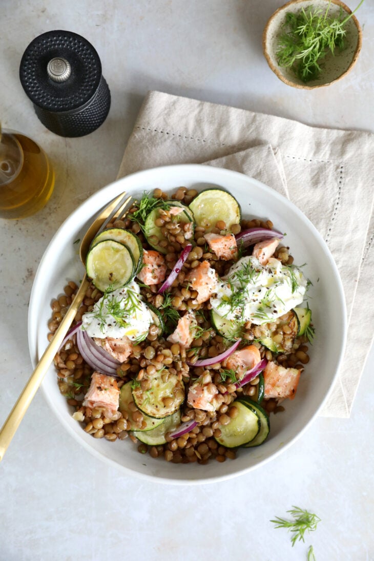 This simple warm salmon lentil salad with tzatziki makes for a great lunch or dinner, packed with nutrients and good-for-you ingredients.