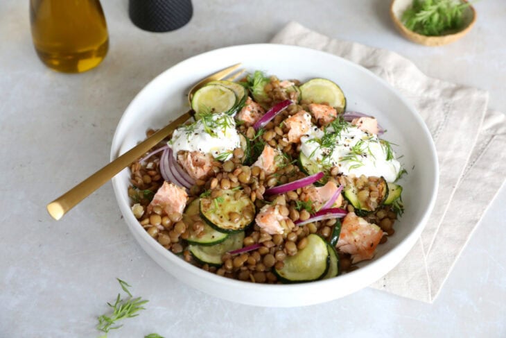 This simple warm salmon lentil salad with tzatziki makes for a great lunch or dinner, packed with nutrients and good-for-you ingredients.