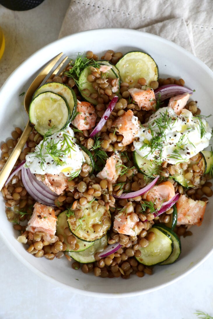 This simple warm salmon lentil salad with tzatziki makes for a great lunch or dinner, packed with nutrients and good-for-you ingredients.