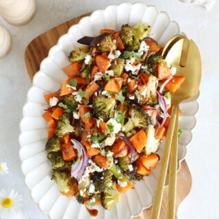Oven-roasted broccoli and sweet potatoes with feta is a simple veggie side dish loaded with flavors. Ready in only 30 minutes in the oven!