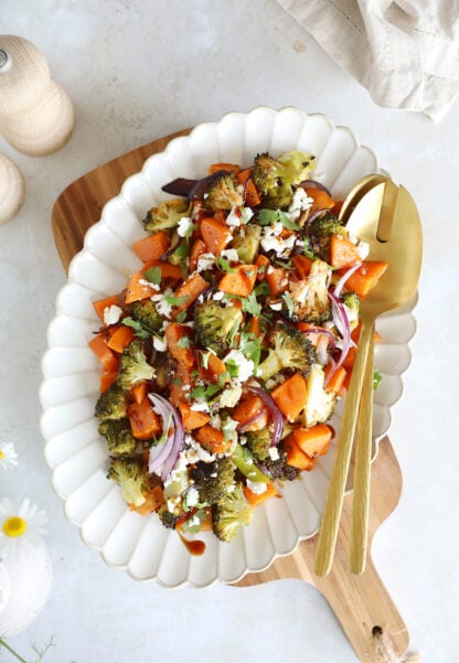 Oven-roasted broccoli and sweet potatoes with feta is a simple veggie side dish loaded with flavors. Ready in only 30 minutes in the oven!