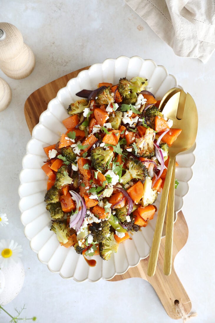 Oven-roasted broccoli and sweet potatoes with feta is a simple veggie side dish loaded with flavors. Ready in only 30 minutes in the oven!