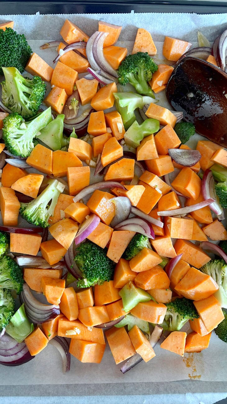 Oven-roasted broccoli and sweet potatoes with feta is a simple veggie side dish loaded with flavors. Ready in only 30 minutes in the oven!